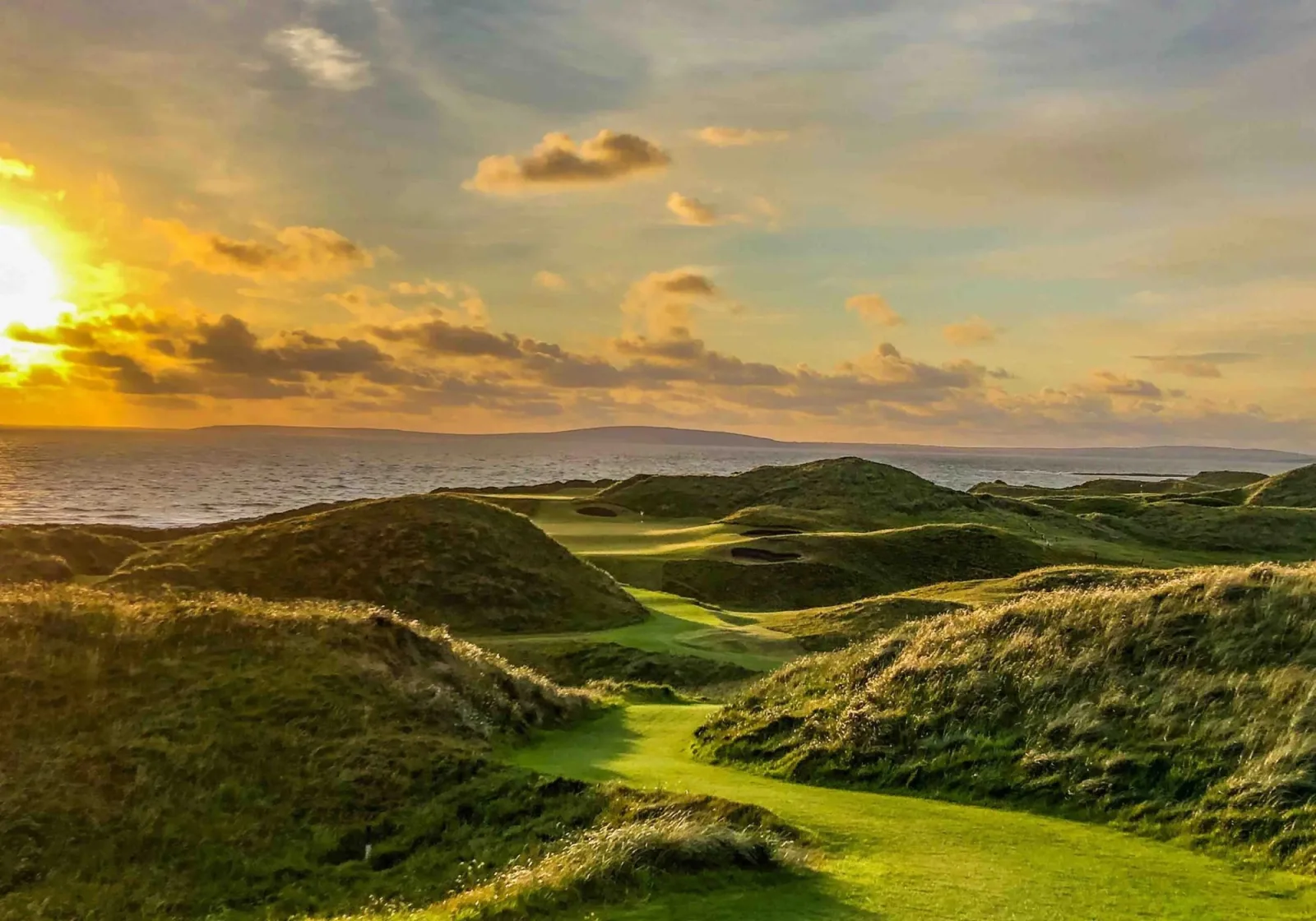 Coastal golf landscape at sunset